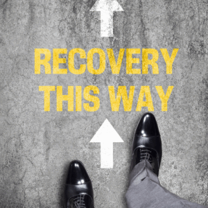 Acute Detox Consultation picture with recovery this way written on the ground with white arrows