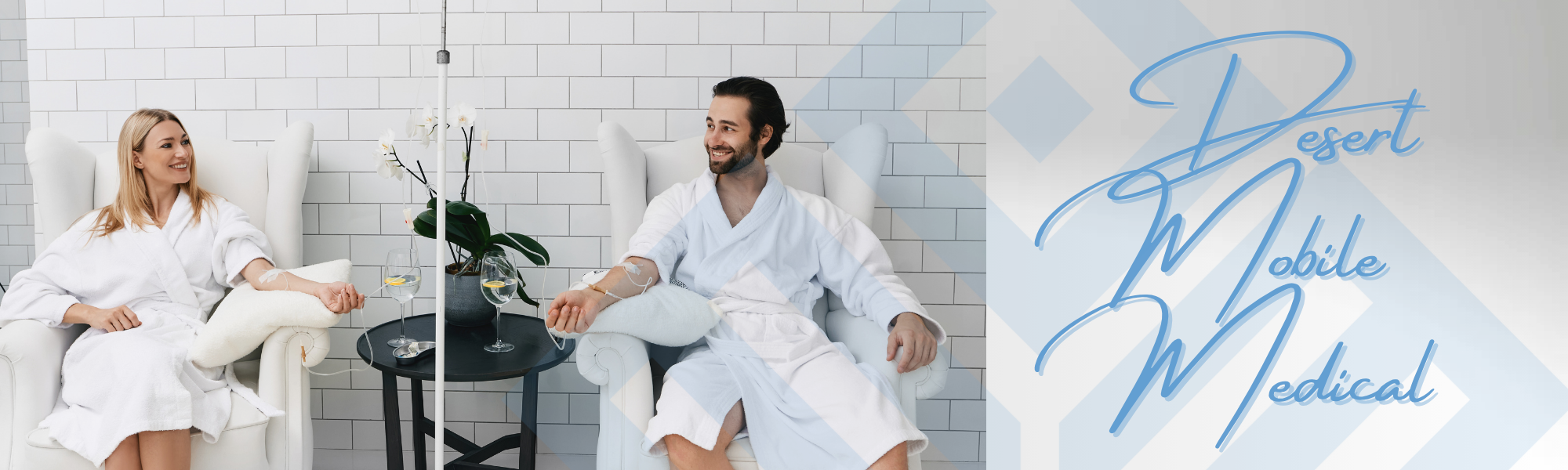 Two people receiving IV Nutritional Therapy in comfortable chairs, wearing white robes, with a medical IV drip stand and a small table with drinks, in a serene, modern setting; branding for Desert Mobile Medical visible.