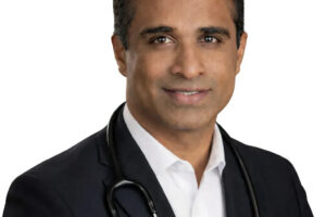 Professional man in a suit with a stethoscope around his neck.